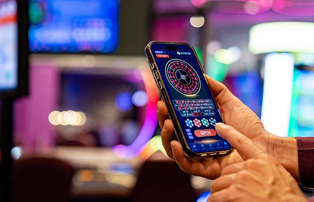Live baccarat dealer handling cards at abutogel table